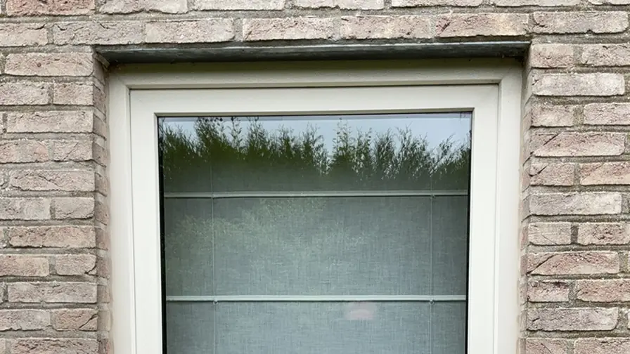 PVC window with aged foil before removal and refinishing PVC window with aged foil before removal and refinishing